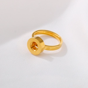 Polished golden stainless steel geometric layered ring with a minimalist circular design
