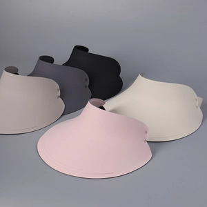 Detail showing five Morandi colors of sun visors with wide brims and matte texture