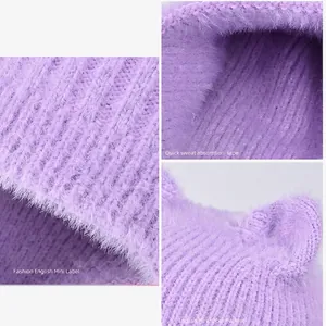Purple knit winter hat for children with cute cat ears and soft plush lining for warmth