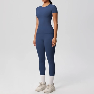 Close-up of navy blue breathable high-stretch yoga set with seamless short sleeve T-shirt
