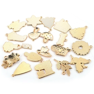 Cartoon tea party themed gold alloy pendants in mushroom and house shapes on white background