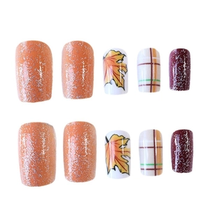 Autumn press-on nails set with orange maple leaf, plaid pattern and glitter finish