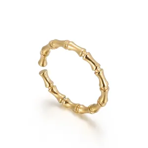 Minimalist gold-plated bamboo joint open ring with a textured aesthetic design
