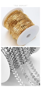 Macro detail of 18k gold and silver V-shaped stainless steel chains for DIY jewelry making