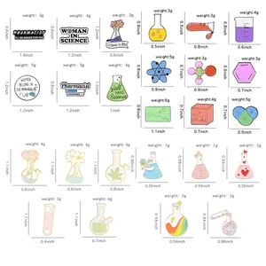 Size chart for 20 science enamel pins featuring microscopes, beakers and atomic models