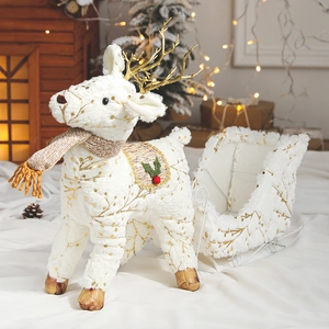Christmas reindeer and plush sleigh decoration set in a warm festive home setting