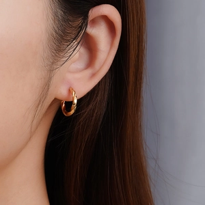 Twisted 18K gold plated stainless steel hoop earrings for women with woven texture design