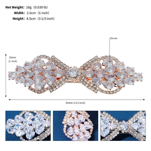 Detail view of zircon inlaid bow hair clip with specific dimensions and weight details