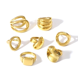 Set of 7 chunky gold geometric stainless steel rings in varied minimalist organic shapes