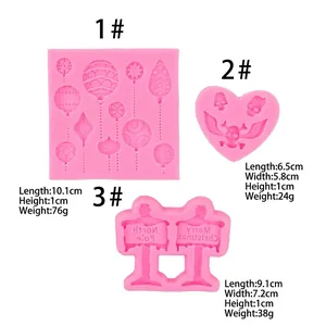 Pink silicone Christmas fondant mold set featuring road signs, balloons and skull shapes