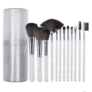 Detail of 12pcs makeup brushes and storage bucket with sparkling silver glitter finish