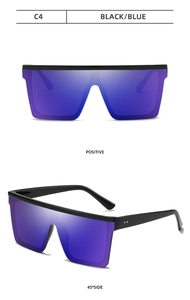 Vue détaillée de lunettes de soleil surdimensionnées noires avec verres dégradés bleus