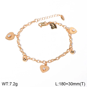 Detail of gold butterfly heart bracelet with small zircon charms and size specifications