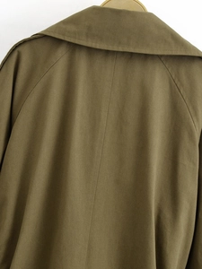 Detail of army green utility jacket with sailor collar and high-quality twill fabric texture