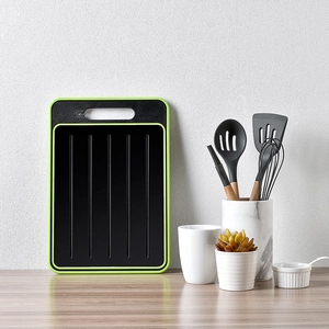 Dual-sided aluminum thawing board and cutting board with non-slip texture in kitchen setting