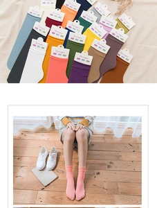 Detailed close-up of colorful nylon velvet socks with ribbed cuffs and soft texture