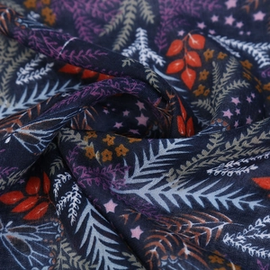 Long navy blue cotton linen beach shawl with orange leaf and star patterns and tassels