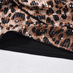 Detail of leopard print sequins with high-quality stitching and black knit lining