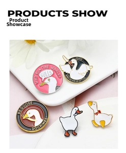 Detailed close-up of funny enamel pins featuring geese with humor text in a ceramic plate