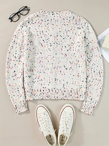 Maglia in maglia bianca con pois colorati e polsini a costine in stile casual