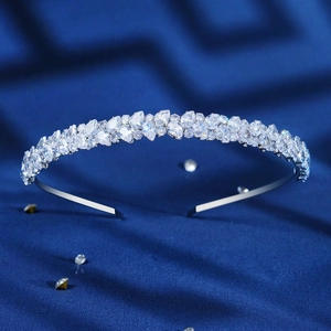 Silver luxury headband featuring sparkling zircon crystals on dark blue velvet