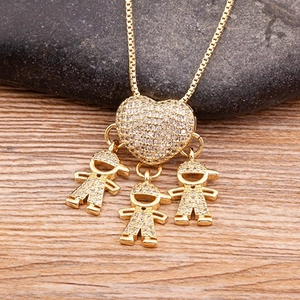 18k gold plated heart pendant necklace with three diamond-studded boy charms