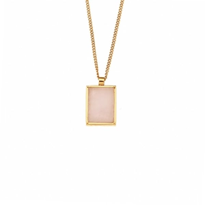Close-up of a 18K gold plated necklace featuring a rectangular pink resin stone pendant