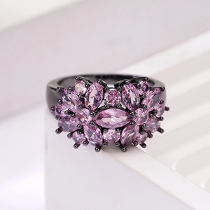 Floral geometric black metal ring with pink marquise-cut cubic zirconia crystals