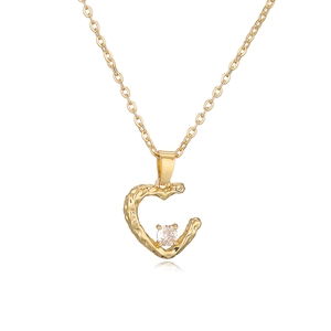 Minimalist gold plated necklace with C-shaped geometric pendant and zircon stone