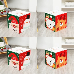 Detail view showing four sides of festive paper Christmas gift boxes with holiday patterns
