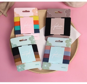 Close-up of 16-piece high elasticity hair tie sets on floral cards in various colors