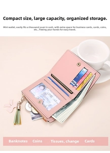 Macro detail of a pink short leather wallet with multiple card slots and tassel zipper
