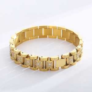 Macro view of gold stainless steel watch band bracelet featuring CNC set white zircons