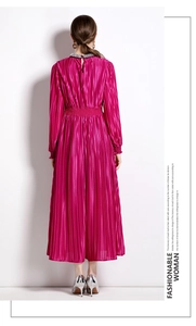 Rear view of rose red pleated long sleeve dress with waist slimming design