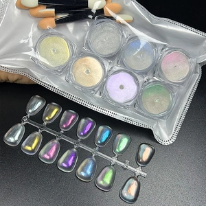 8-color aurora nail chrome powder set with sponge sticks and display swatches on black backdrop