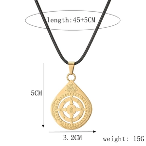Detail view of a gold lotus pendant with precise size measurements and rope length specs