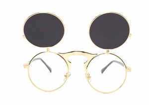 Macro view of steampunk steampunk flip-up sunglasses with golden metal round frames