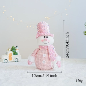 Detail view of pink sequined snowman doll with knitted texture for Christmas decor