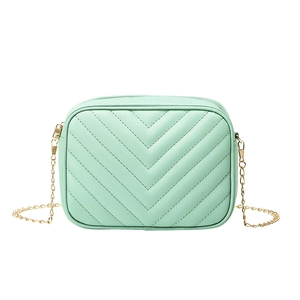 Mint green quilted small crossbody bag with V-shaped chevron pattern and gold chain