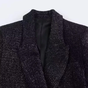 Women's black tweed blazer with silver metallic thread and classic lapel collar detail