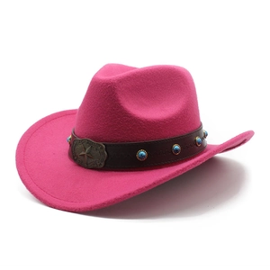 Detail of rose red felt cowboy hat with leather band and turquoise studs
