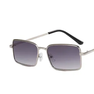 Square silver metal sunglasses with grey gradient lenses at 45-degree angle