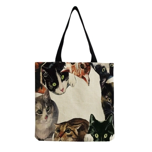 Close-up of durable linen tote bag featuring various colorful cute cat illustrations