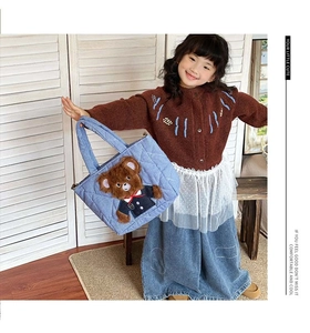 Blue plaid quilted crossbody bag with a cute 3D brown plush teddy bear charm