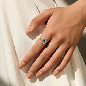 Elegant S925 silver halo ring with a square blue moissanite and white accent stones