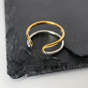 Minimalist wavy double-layer two-tone ring in gold and silver finish on stone