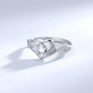 Detail of a 304 stainless steel luminous heart ring with a shiny round cubic zirconia stone