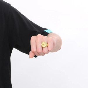 Hip hop style gold plated stainless steel signet ring with compass relief on finger