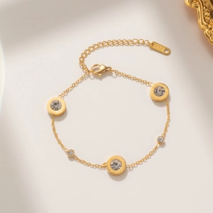 Elegant gold titanium bracelet with Roman numeral charms and sparkling zircons for women