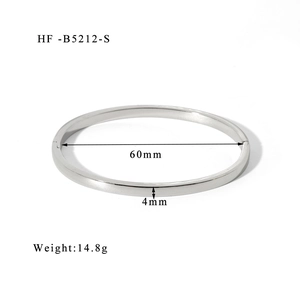 Macro detail of 4mm silver titanium steel bangle showing dimensions and 60mm inner diameter